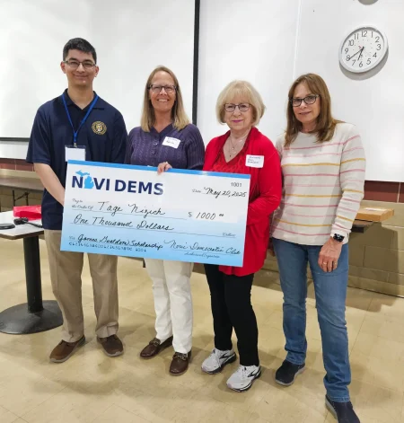 Photo of scholarship recipient Tage, with section committee memmbers