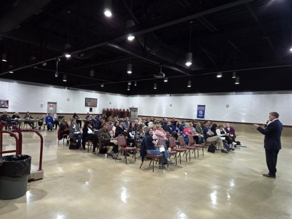 Sean Carlson addresses membership at October meeting.